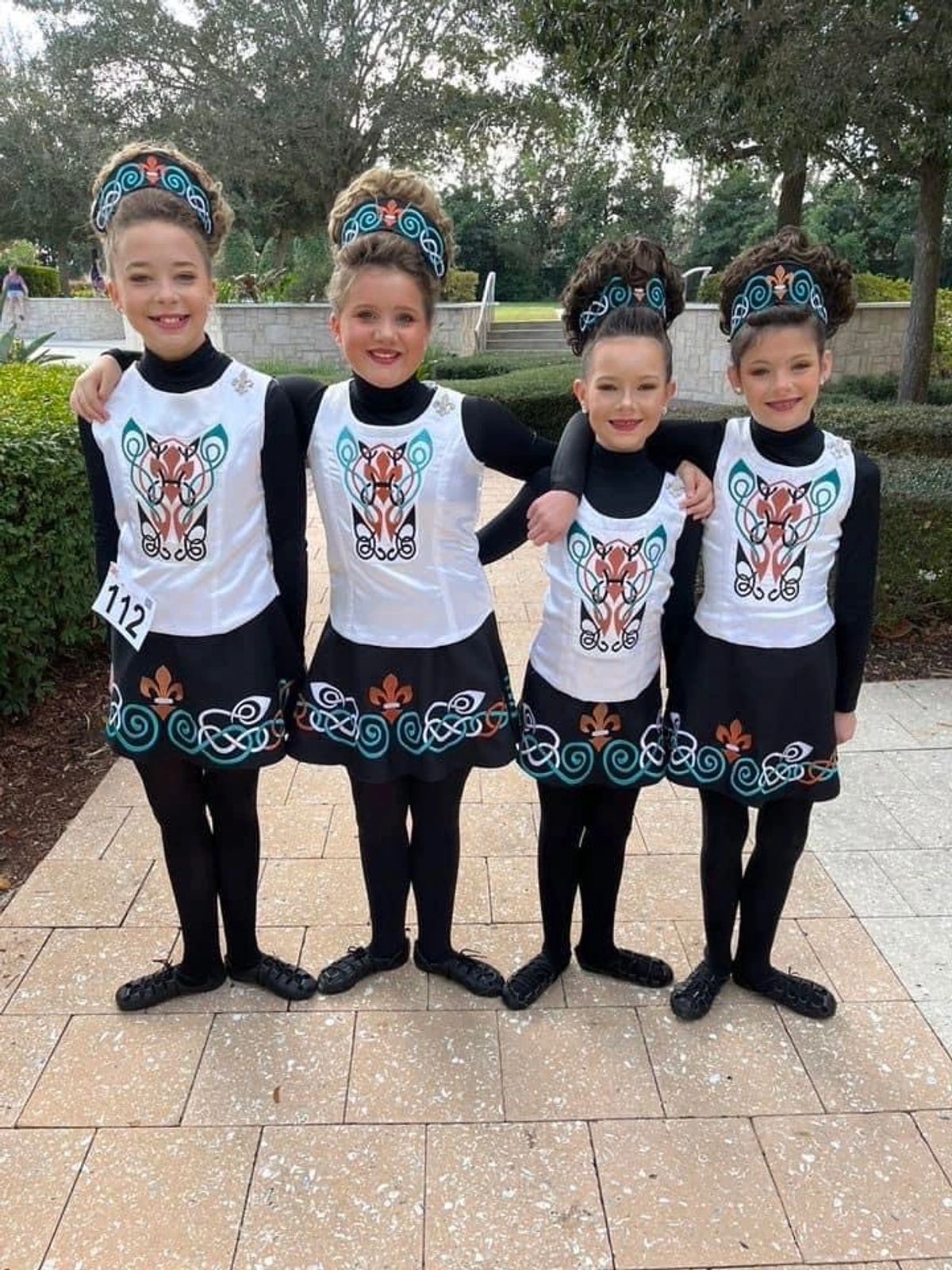Four young dancers in Muggivan costume